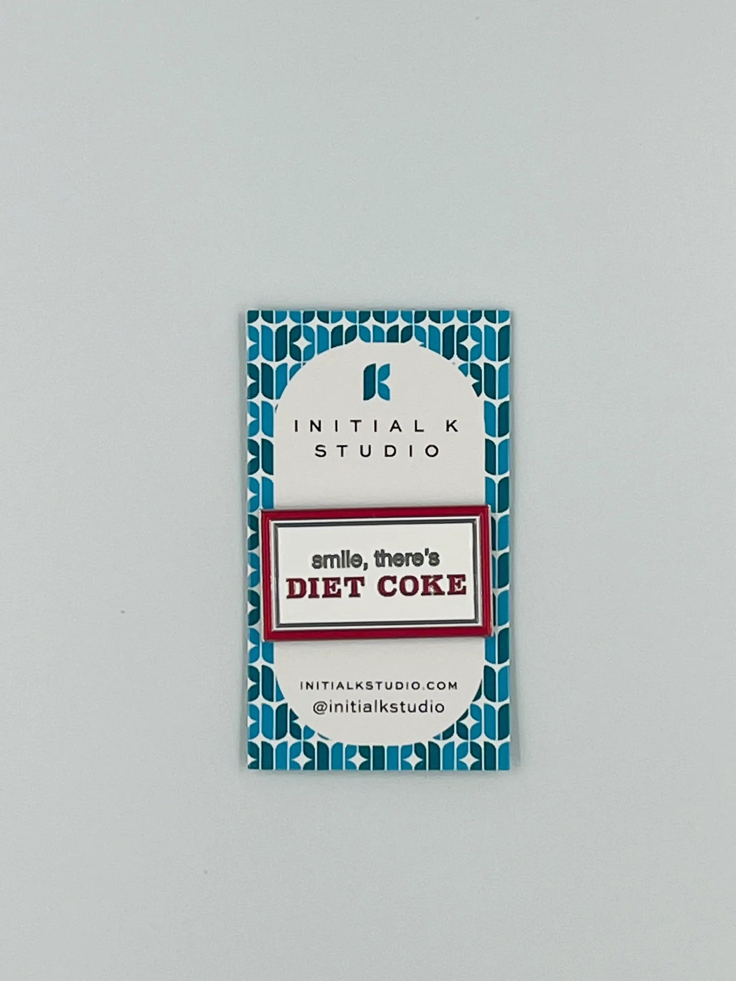 Smile, there’s Diet Coke Needle Minder