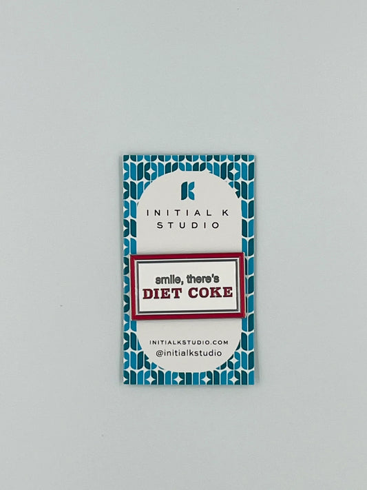 Smile, there’s Diet Coke Needle Minder